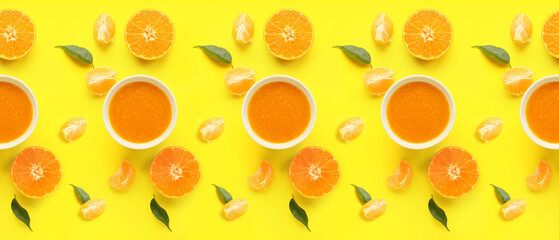 Bowl of tasty tangerine jam on yellow background