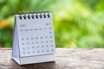 April 2023 table calendar with customizable space for text or ideas. Monthly calendar concept and...