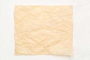Sheet of baking paper on white background