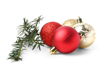 Beautiful Christmas balls and coniferous branch on white background