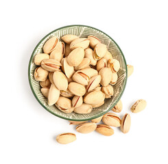 Plate with tasty pistachio nuts isolated on white background