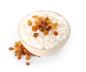 Fototapeta na wymiar Bowl with delicious rice pudding and raisins on white background