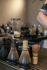 Bamboo whisk matcha green tea brush as a stirrer. Traditional  Japanese tea ceremony. Tea accessories concept.