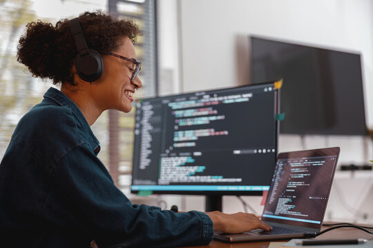 Freelancer female making new project as web designer and programmer on her computer at home office
