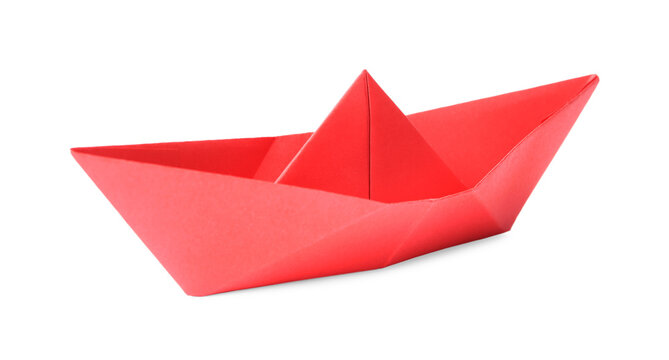 Red paper boat isolated on white. Origami art