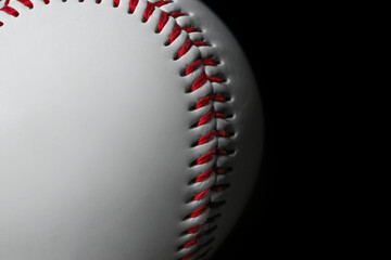 Closeup view of baseball ball on dark background, space for text. Sportive equipment