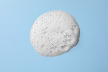Foam sample on light blue background, top view