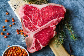 Thick Raw T-Bone or porterhouse Steak with Seasoning