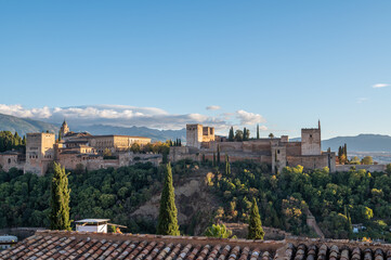 Fototapeta na wymiar Aerial view of the Alhambra Palace in Granada, Spain with snow-capped Sierra Nevada mountains in the background.