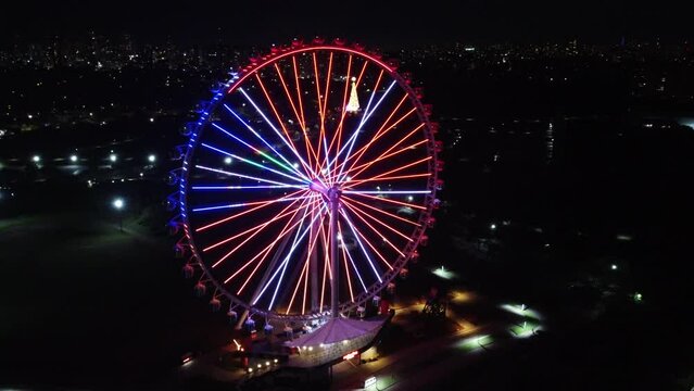 S&Atilde;O PAULO, BRAZIL DECEMBER 26, 2022 Aerial Photography Aerial view of the largest Ferris wheel in Latin America. Officially called Roda Rico, it is working in Parque C&acirc;ndido Portinari, next to Parqu