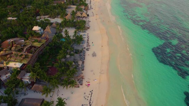 Aerial View Of Sandy Akiin Beach With Turquoise Sea Waves Of The Caribbean Gently Breaking. Dolly Back
