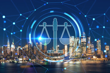 New York City skyline from New Jersey over the Hudson River with Hudson Yards at night. Manhattan, Midtown. Glowing hologram legal icons. The concept of law, order, regulations and digital justice