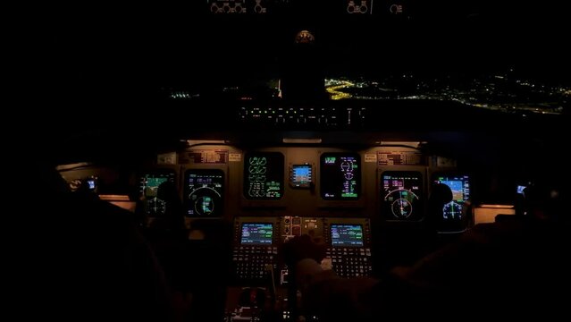 Exclusive inner cockpit view during a real night flight during the approach to Valencias’s airport, Spain.