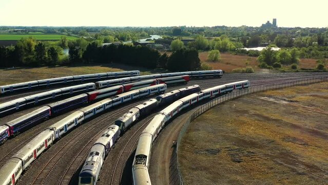 Aerial view of railway sidings with trains and locomotives. Ely, Cambridgeshire, UK.