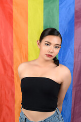 Fototapeta premium Pretty woman LGBQ pose with muli-color flag