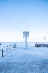 Frozen city after freezing rain. Vladivostok. The street lamp is frozen. Winter city. city in ice