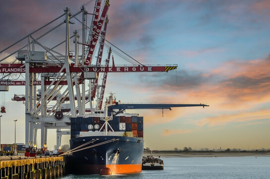 Unloading a container ship in the industrial port of Dunkirk in northern France