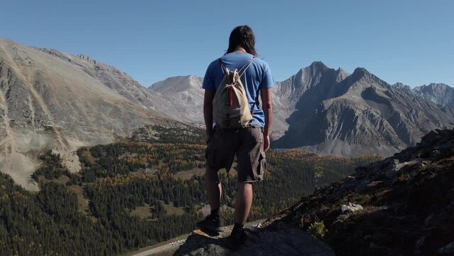 Hiker sighing smiling and noding approached Kananaskis Alberta Canada