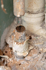 Old water pipe clogged with rust