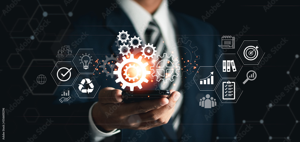 Aufkleber businessman with gears on virtual interface. business process analysis and innovation with global ne