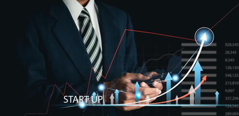 Businessman analyzing business plan growth and growth of positive indicators in business. Digital charts on a virtual interface. Business planning concept.