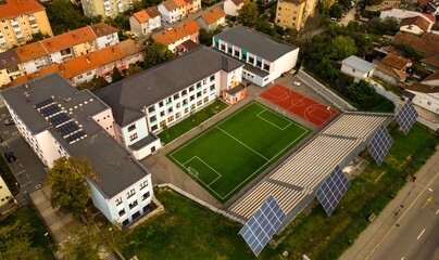  Aerial view of a modern and stylish school situated in the city of Resita, Romania.