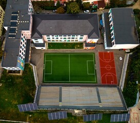  Aerial view of a modern and stylish school situated in the city of Resita, Romania.