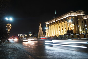 Fototapeta na wymiar Almaty, Kazakhstan - 12.22.2022 : The central streets of the city are decorated with Christmas tree toys, garlands and tinsel.