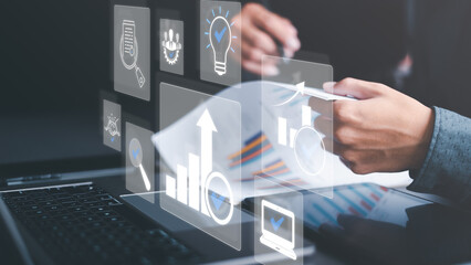 Business people read business statistics chart reports, to analyze and improve corporate strategy, manage financial and marketing documents, update annual budget accounts, company growth data.