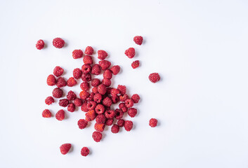 freshly red raspberries isolated on white background