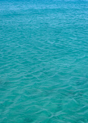 Background with blue sea surface in vertical