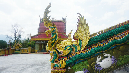 Fototapeta premium Naga Stairway to Wat Ban Ngao Temple (Wat Baan Ngaw), Ranong, Thailand of all Naga stairways to Buddhist temples in Thailand.