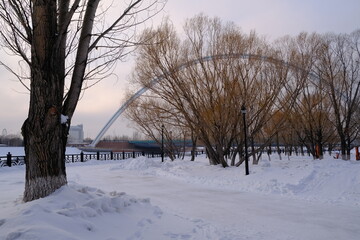 Winter landscape at sunset in the park