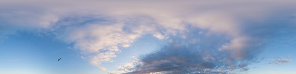 Dark blue sunset sky panorama with pink Cumulus clouds. Seamless hdr 360 panorama in spherical equirectangular format. Full zenith for 3D visualization, sky replacement for aerial drone panoramas.