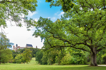 Fototapeta na wymiar Coburg, Germany - September 16, 2022: Cityscape with view on Coburg castles from park and gardens in ancient city of Coburg in Upper Franconia, Bavaria in Germany