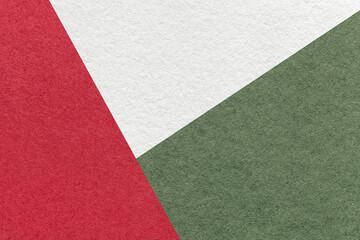 Fototapeta premium Texture of craft white, red and olive color paper background, macro. Vintage wine abstract cardboard with gradient.