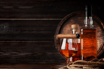 Glass and bottle with cognac