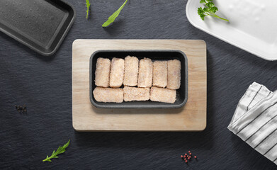 Spanish Croquetas on a flat lay of a kitchen with various items