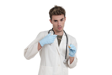 Young caucasian male doctor preparing a dose of a vaccine. Isolated over white background.