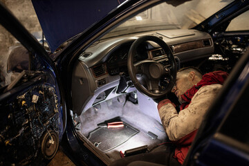 disassemble the center console of the car torpedo for interior detailing and repair.