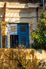 Fototapeta na wymiar HOCHIMINH CITY, VIETNAM - SEPTEMBER 1, 2022: The old houses on Le Loi Street, District 1, Saigon have been barricaded after eight years to build the underground subway line next to it.