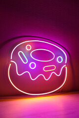 Multicolored neon sign donut. Trendy style. Neon sign. Custom neon.