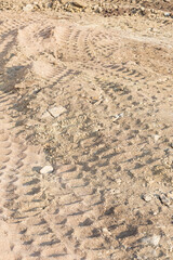 Wheel tracks on sand dirt