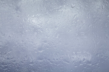 Drops of rain on glass