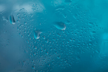 Drops of rain on glass