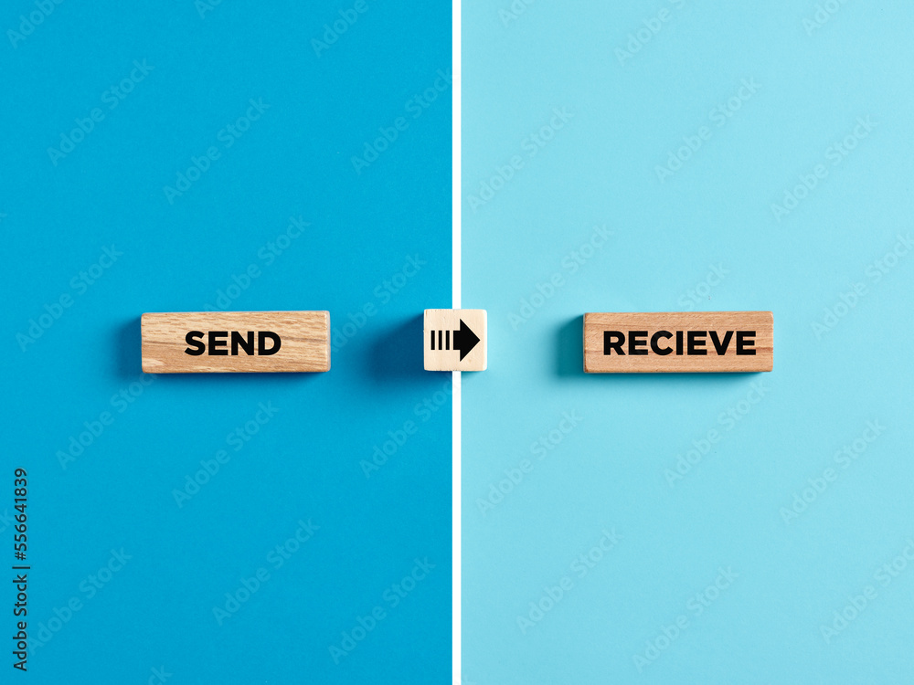 Poster the words send and receive on wooden blocks with arrow direction symbol. communication or connection