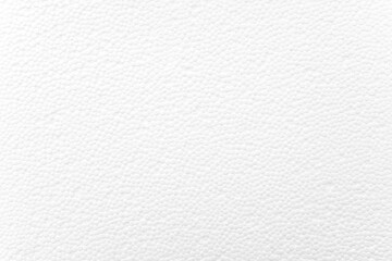 White foam plastic or styrofoam as texture or background, top view, space for text
