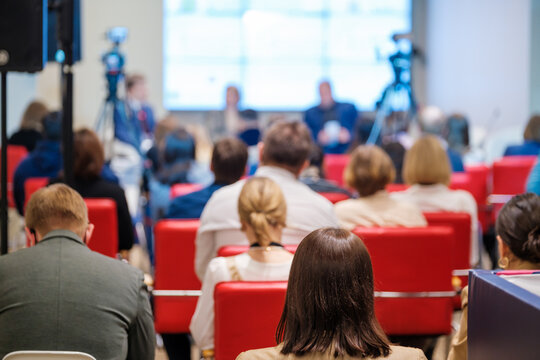 Crowd during business seminar in auditorium