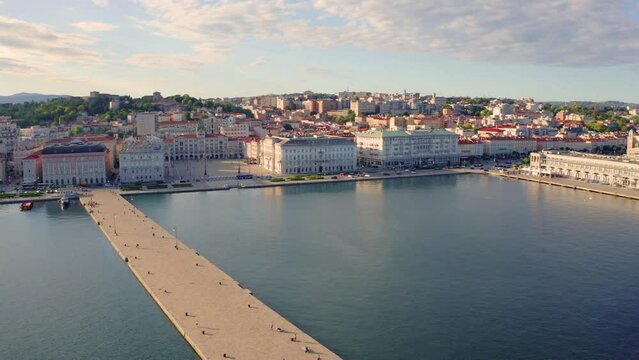 4K aerial - a bird's eye view&nbsp;video (Ultra High Definition) of Triest cityscape. Splendid summer view from flying drone of Italy, Europe. Aerial seascape of Adriatic sea. Traveling concept background.