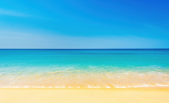 clear blue sea with horizon, blue sky Light clouds and clean sand